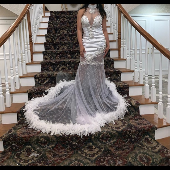 White choker neck, mermaid tail prom dress with feathers.